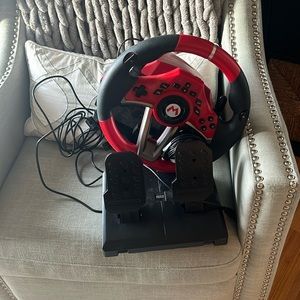 Mario Kart racing wheel and pedals accessory